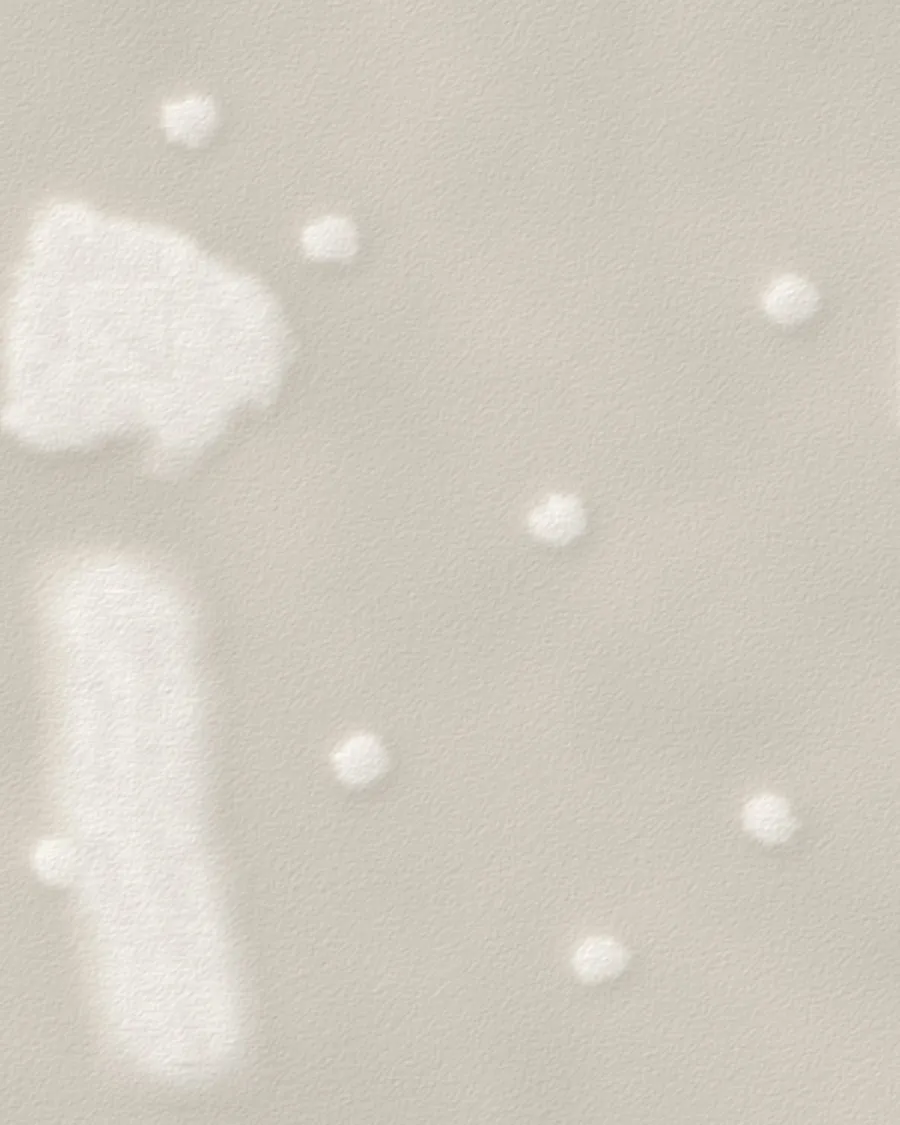 A sample board of drywall: feathered joint compound over a patched hole, a taped crack and filled screw pops, then primer, a first coat of sage paint with roller laps, and an even second coat